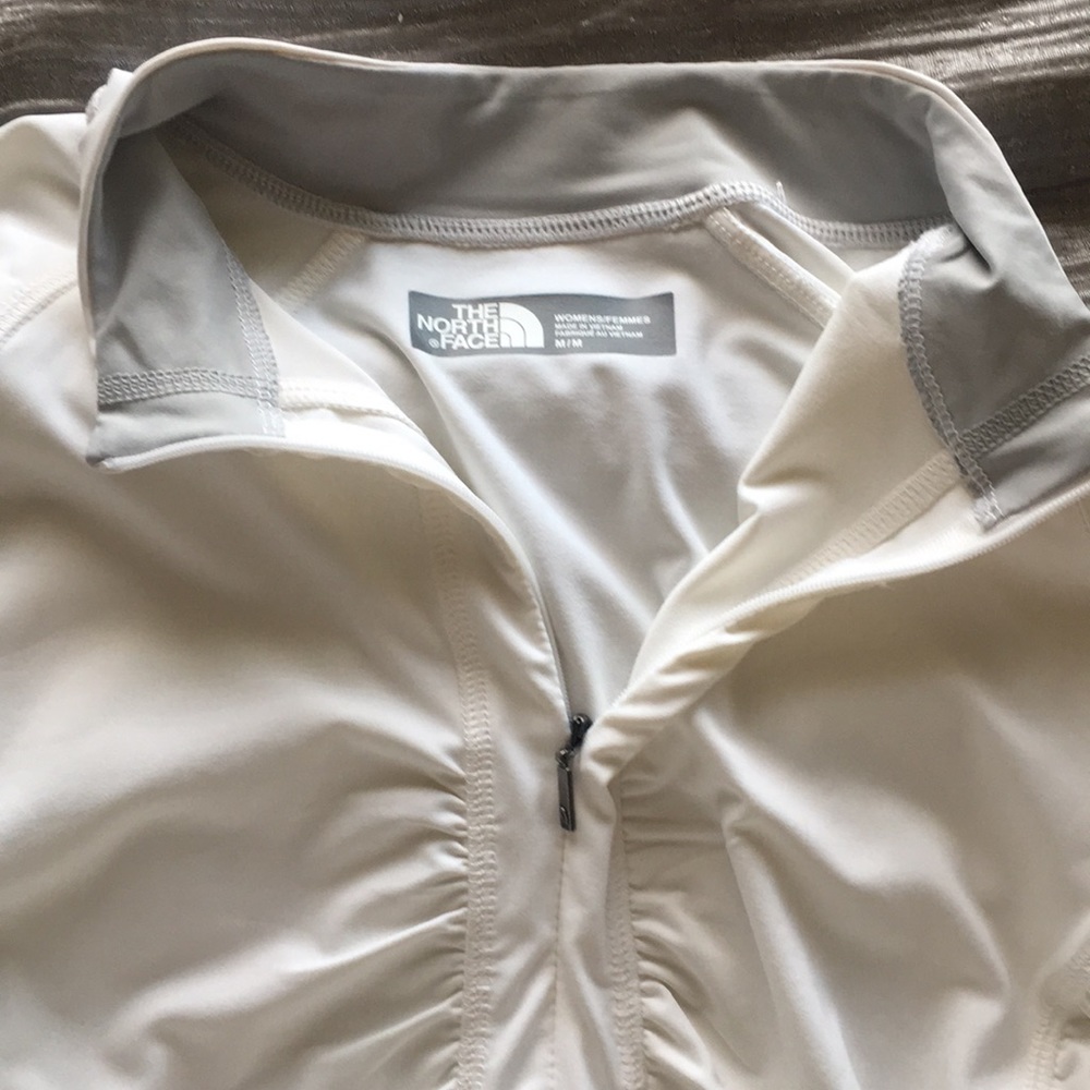 White, feminine, North Face, athletic sweater.